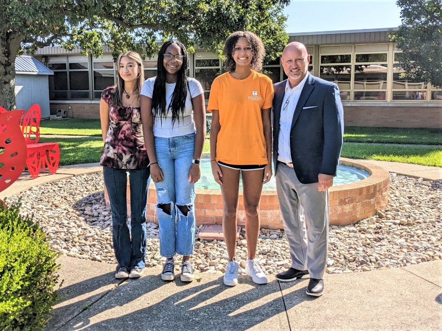 Students earning National Board honors with Travis Hunt